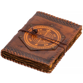 Kožený zápisník s patinovaným papírem a symbolem kompasu
