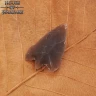 Kleine dreieckige Pfeilspitze mit Stiel aus Flintstein 4cm
