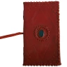 Středověký kožený zápisník s ozdobným kamenem