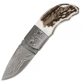 Pocket knife made of Damascus steel with deer horn handle scales