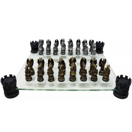 Chess pieces Dragons, gold and silver pieces with glass chess board