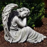 Garden angel 37cm sitting head on knees, grey-green patina