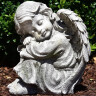 Garden angel 24cm sitting, head left, grey-green patina