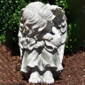 Garden angel 24cm sitting, head left, grey-green patina