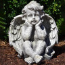 Garden angel 27cm sitting head in hands, grey-green patina