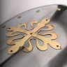 Metal shield with golden Calatrava Cross