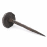 Hand-forged nail with a decorative head eight-petalled rosette
