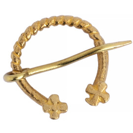 Notched brass fibula with crosses at ends