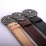 Leather belt with a sumptuously decorated buckle