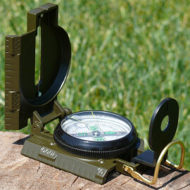 Oil-filled military compass with metal housing