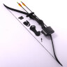 Recurve bow with three arrows and a bracer