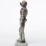 Tin knight statue in Tornament Armor with Armet