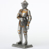 Tin knight statue in armor with sword mittens gauntlets