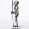 Tin knight statue in armor with short lance