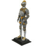 Renaissance knight in a gilded armor, figure
